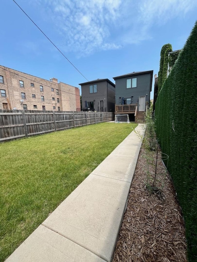 6336 S Kimbark Ave, Chicago, IL 60637 - fenced backyard with a wooden deck