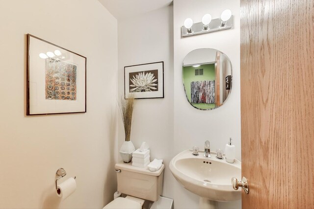 1226 Beau Dr, Park Ridge, IL 60068 - half bathroom with a sink and toilet