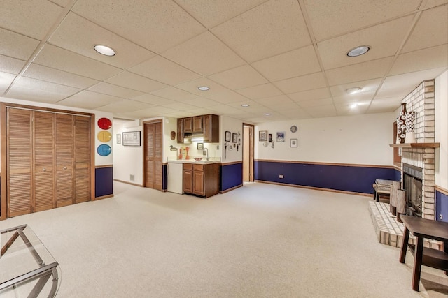 1226 Beau Dr, Park Ridge, IL 60068 - interior space featuring a fireplace, carpet flooring, a sink, a paneled ceiling, and recessed lighting