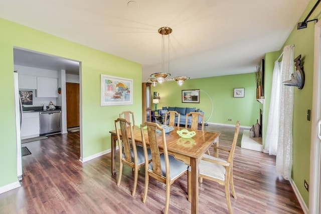1226 Beau Dr, Park Ridge, IL 60068 - dining room with dark wood-style flooring and baseboards