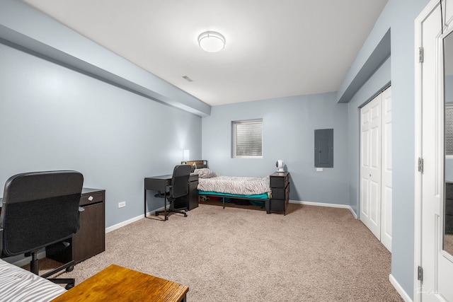 24147 S Sunset Dr, Channahon, IL 60410 - bedroom with electric panel, carpet floors, a desk, and a closet