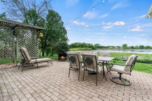 7 Farmington Ct, Lake In The Hills, IL 60156 - view of patio / terrace with a water view and outdoor dining area