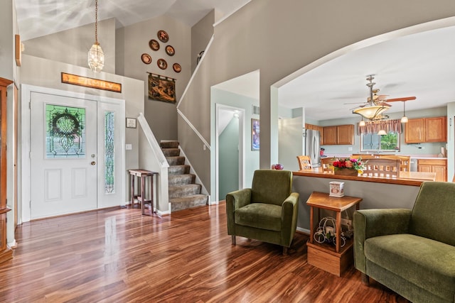 7 Farmington Ct, Lake In The Hills, IL 60156 - foyer entrance with wood finished floors, stairway, a high ceiling, and baseboards