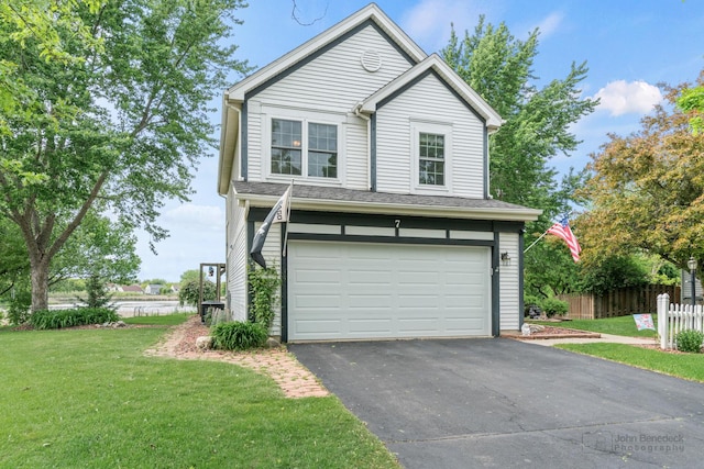 7 Farmington Ct, Lake In The Hills, IL 60156 - traditional-style home with asphalt driveway and an attached garage