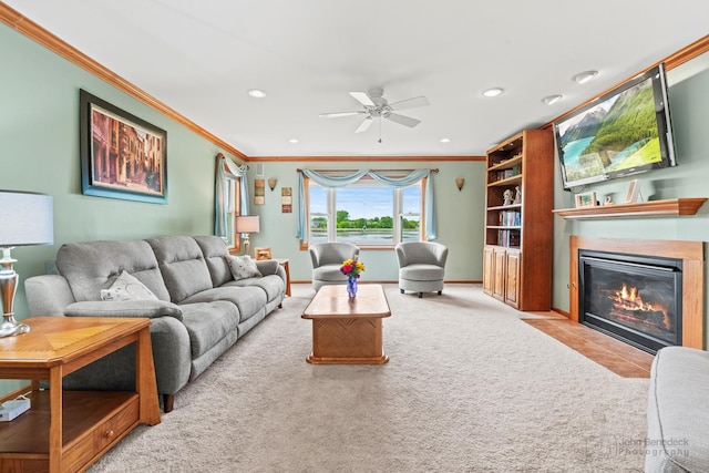 7 Farmington Ct, Lake In The Hills, IL 60156 - carpeted living room with crown molding, a ceiling fan, a fireplace with flush hearth, recessed lighting, and baseboards