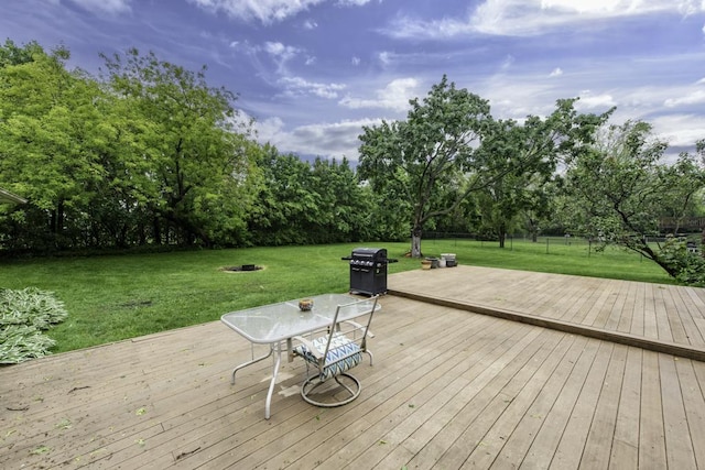 2632 E Bonnie Brook Ln, Waukegan, IL 60087 - deck with grilling area, view of scattered trees, and outdoor dining space