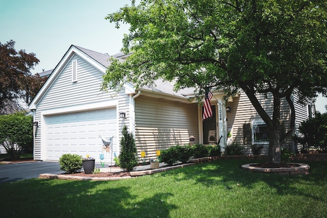 1024 Lakestone Ln, Aurora, IL 60504 - view of front of home with driveway, a garage, and a front yard