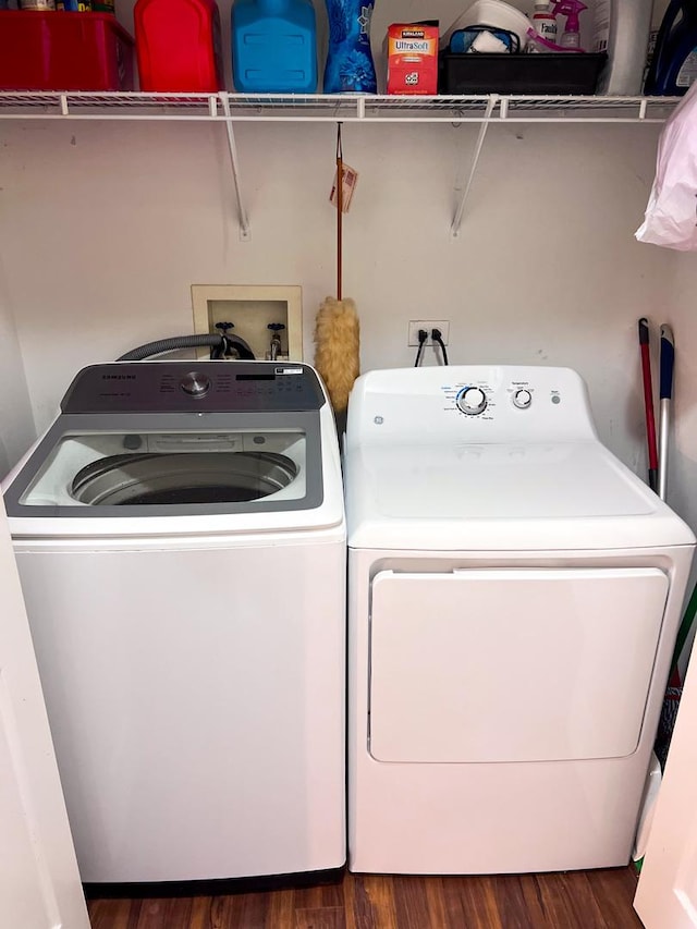 1024 Lakestone Ln, Aurora, IL 60504 - laundry room featuring washer and clothes dryer and wood finished floors