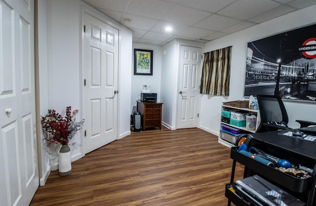 1024 Lakestone Ln, Aurora, IL 60504 - home office with wood finished floors, a drop ceiling, and baseboards