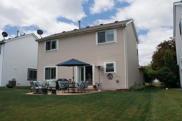 1024 Lakestone Ln, Aurora, IL 60504 - back of house featuring a yard, a patio area, and central AC