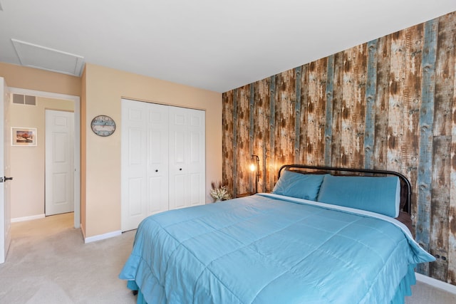 211 Spring Point Dr, Carpentersville, IL 60110 - bedroom with carpet floors, an accent wall, a closet, and attic access