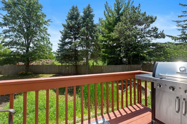 211 Spring Point Dr, Carpentersville, IL 60110 - wooden terrace with a fenced backyard and grilling area