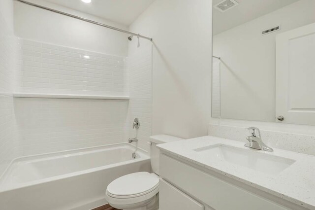 2145 Yellowstone Blvd, Mundelein, IL 60060 - full bathroom featuring toilet, vanity, and tub / shower combination