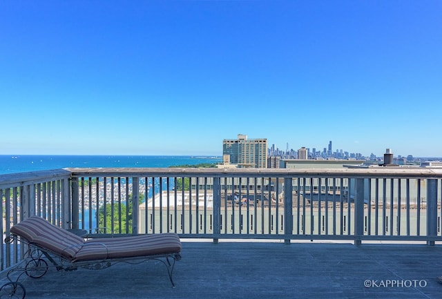 3600 N Lake Shore Dr Unit 1603, Chicago, IL 60613 - wooden terrace with a skyline view and a water view