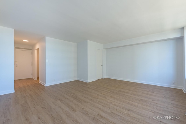 3600 N Lake Shore Dr Unit 1603, Chicago, IL 60613 - unfurnished room with light wood-style floors and baseboards