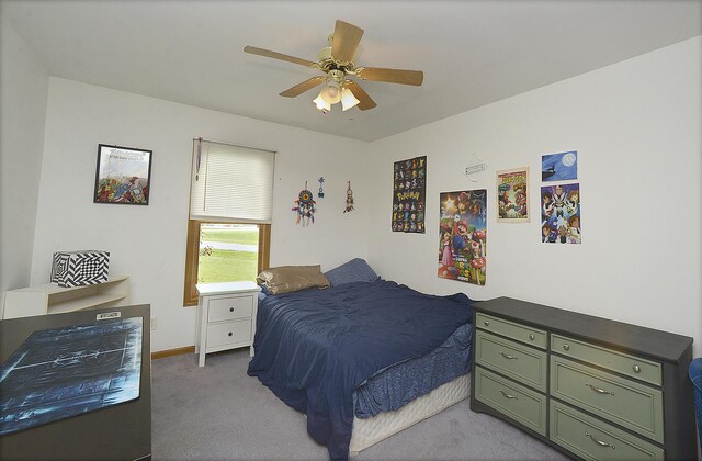 2098 N 15th Rd, Streator, IL 61364 - carpeted bedroom with a ceiling fan and baseboards