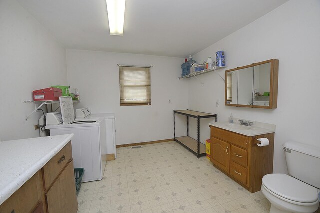 2098 N 15th Rd, Streator, IL 61364 - washroom with washer and dryer and light floors