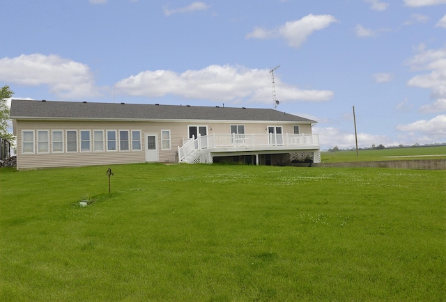 2098 N 15th Rd, Streator, IL 61364 - back of property featuring a wooden deck and a lawn