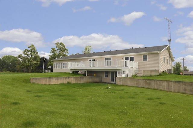 2098 N 15th Rd, Streator, IL 61364 - back of property featuring a wooden deck, a lawn, and central AC unit