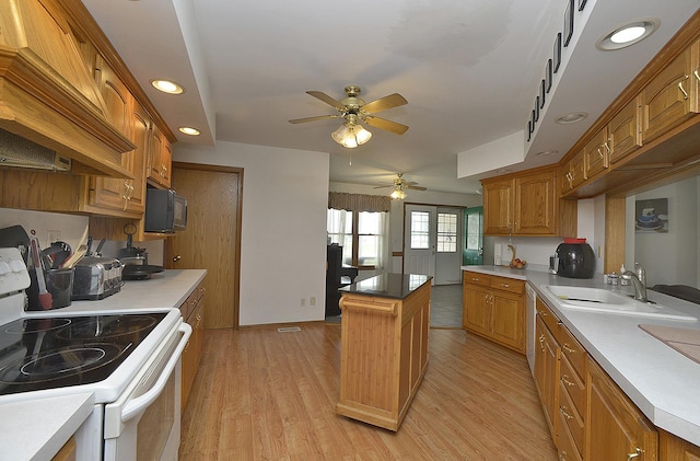 2098 N 15th Rd, Streator, IL 61364 - kitchen featuring white electric range, custom range hood, recessed lighting, ceiling fan, and a kitchen island