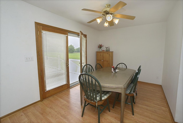 2098 N 15th Rd, Streator, IL 61364 - dining room with light wood-style floors, ceiling fan, and baseboards
