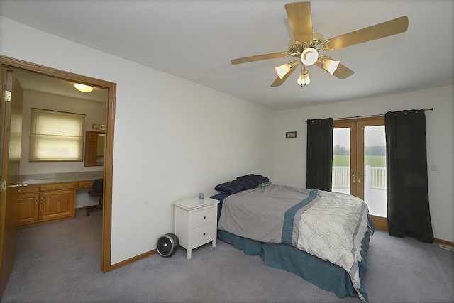 2098 N 15th Rd, Streator, IL 61364 - carpeted bedroom featuring access to outside, french doors, baseboards, ceiling fan, and an office area