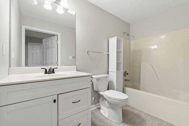 9810 Parkway Dr None, Unit None, Highland, IN 46322 - full bath with toilet, vanity, shower / tub combination, and baseboards