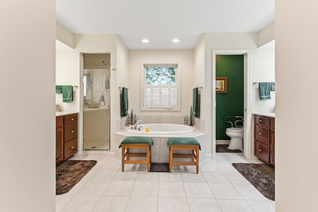 2910 Greystone Pl, Champaign, IL 61822 - full bath with a stall shower, a bath, tile patterned flooring, vanity, and recessed lighting