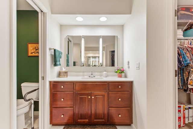 2910 Greystone Pl, Champaign, IL 61822 - bathroom featuring vanity and a spacious closet