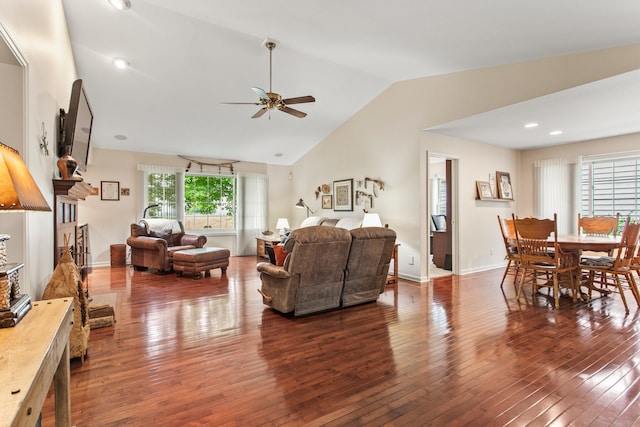 2910 Greystone Pl, Champaign, IL 61822 - living room featuring vaulted ceiling, hardwood / wood-style flooring, ceiling fan, and a fireplace