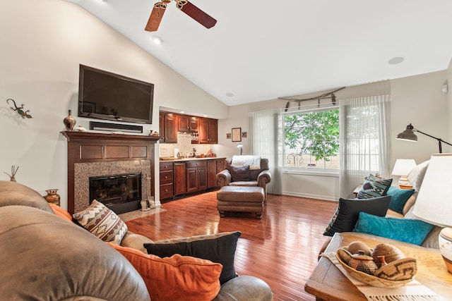 2910 Greystone Pl, Champaign, IL 61822 - living room with a ceiling fan, hardwood / wood-style flooring, high vaulted ceiling, and a premium fireplace