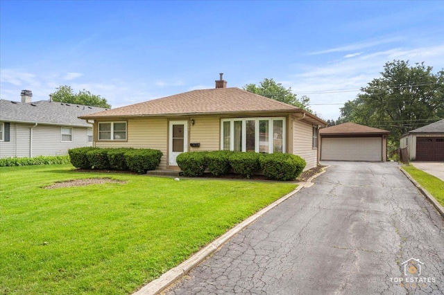 3604 Owl Dr, Rolling Meadows, IL 60008 - view of front of home with a garage, a front lawn, an outdoor structure, and a chimney