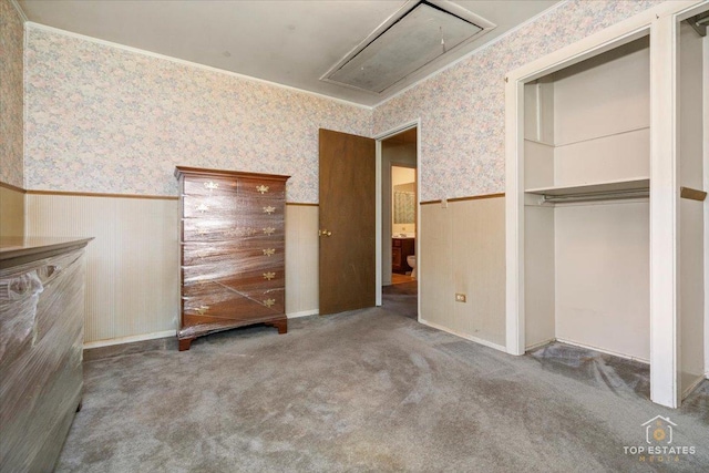 3604 Owl Dr, Rolling Meadows, IL 60008 - unfurnished bedroom featuring wallpapered walls, attic access, wainscoting, carpet floors, and a closet