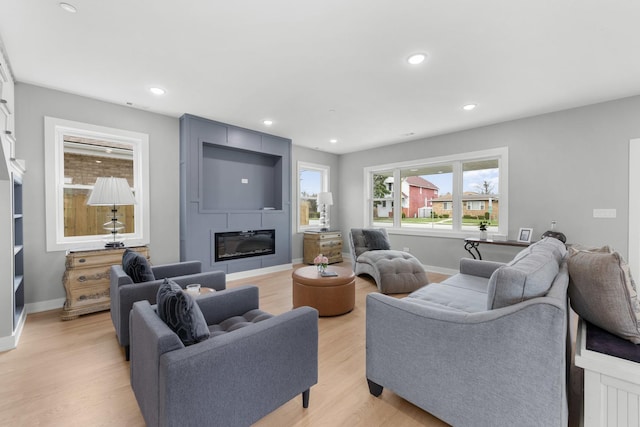 4113 Eberly Ave, Brookfield, IL 60513 - living area featuring light wood finished floors, a fireplace, baseboards, and recessed lighting