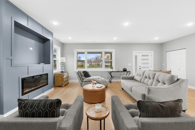 4113 Eberly Ave, Brookfield, IL 60513 - living area featuring a fireplace, light wood-type flooring, recessed lighting, and baseboards