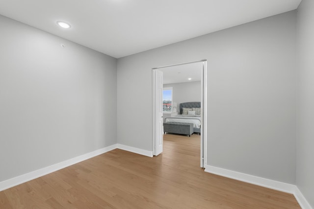 4113 Eberly Ave, Brookfield, IL 60513 - empty room with light wood-style floors, baseboards, and recessed lighting