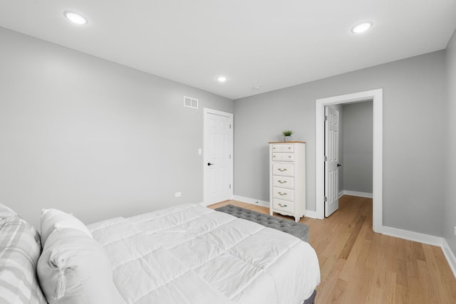 4113 Eberly Ave, Brookfield, IL 60513 - bedroom featuring baseboards, light wood-style floors, and recessed lighting