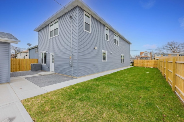 4113 Eberly Ave, Brookfield, IL 60513 - rear view of property featuring central air condition unit and a patio