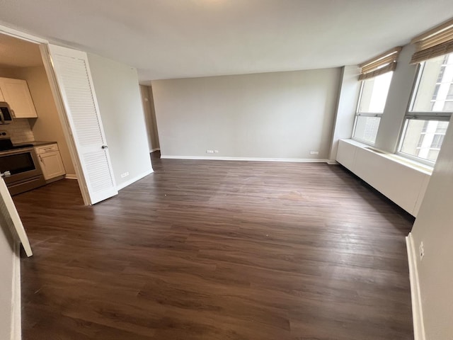 2626 N Lakeview Ave Unit 1509, Chicago, IL 60614 - spare room with dark wood-type flooring and baseboards