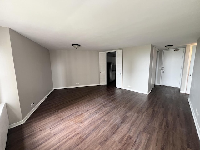 2626 N Lakeview Ave Unit 1509, Chicago, IL 60614 - unfurnished room featuring baseboards and dark wood finished floors