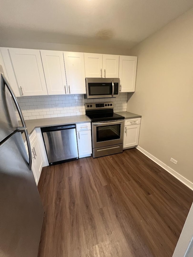 2626 N Lakeview Ave Unit 1509, Chicago, IL 60614 - kitchen featuring stainless steel appliances, white cabinetry, decorative backsplash, and dark wood-style flooring