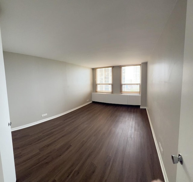 2626 N Lakeview Ave Unit 1509, Chicago, IL 60614 - spare room with dark wood-style floors and baseboards
