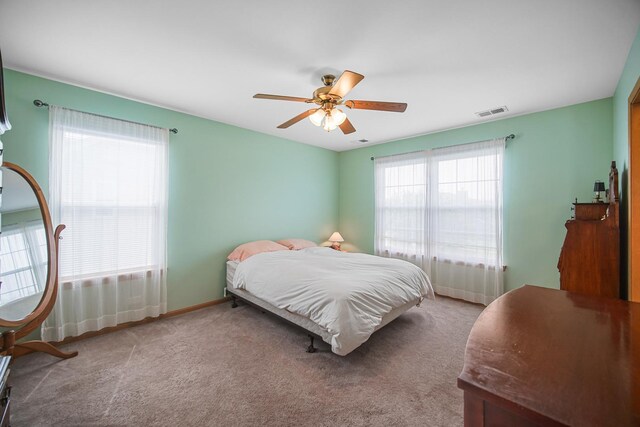 2802 Forestview Dr, Carpentersville, IL 60110 - carpeted bedroom featuring a ceiling fan and baseboards