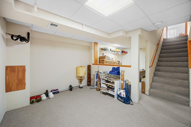 2802 Forestview Dr, Carpentersville, IL 60110 - below grade area featuring carpet flooring, a drop ceiling, and stairs