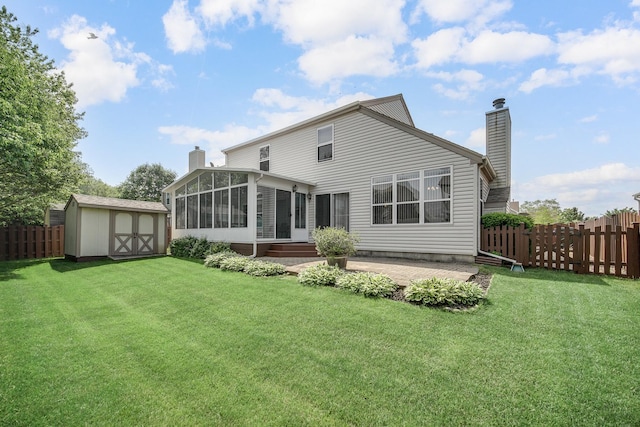 2802 Forestview Dr, Carpentersville, IL 60110 - rear view of property featuring a chimney, a sunroom, and a patio