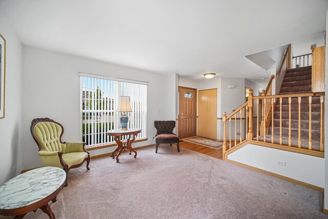 2802 Forestview Dr, Carpentersville, IL 60110 - sitting room with stairway, carpet floors, and baseboards