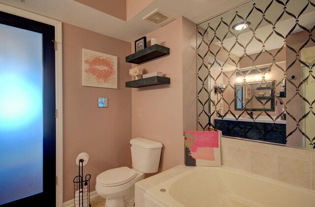 14121 Norwich Ln Unit 301, Orland Park, IL 60467 - bathroom with toilet and a bath