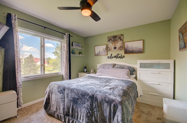 14121 Norwich Ln Unit 301, Orland Park, IL 60467 - bedroom with carpet flooring, radiator heating unit, baseboards, and a ceiling fan