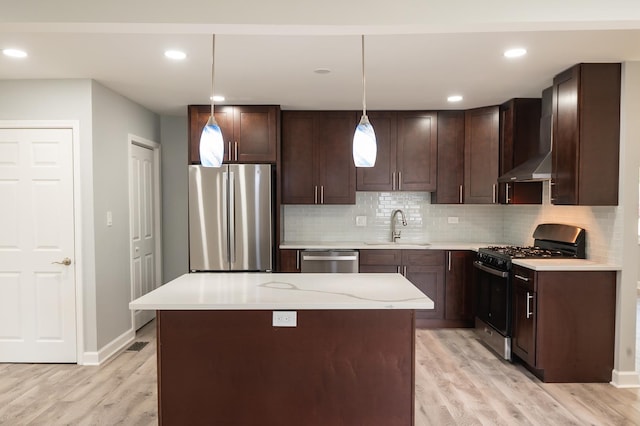 620 Ashland St, Hoffman Estates, IL 60169 - kitchen featuring stainless steel appliances, a sink, light wood-type flooring, dark brown cabinetry, and decorative backsplash