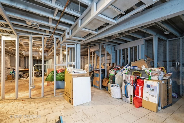 3540 S Prairie Ave Unit 1, Chicago, IL 60653 - unfinished basement with light tile patterned floors